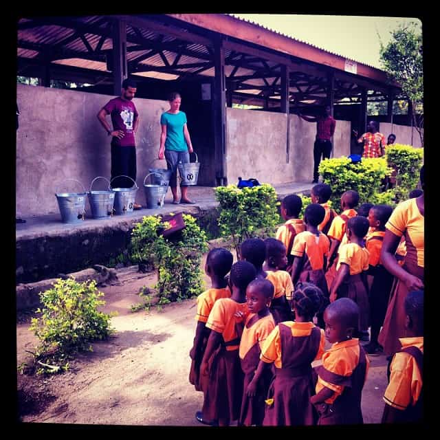 Assembly at Gboloo where we are presenting hand washing buckets to the school