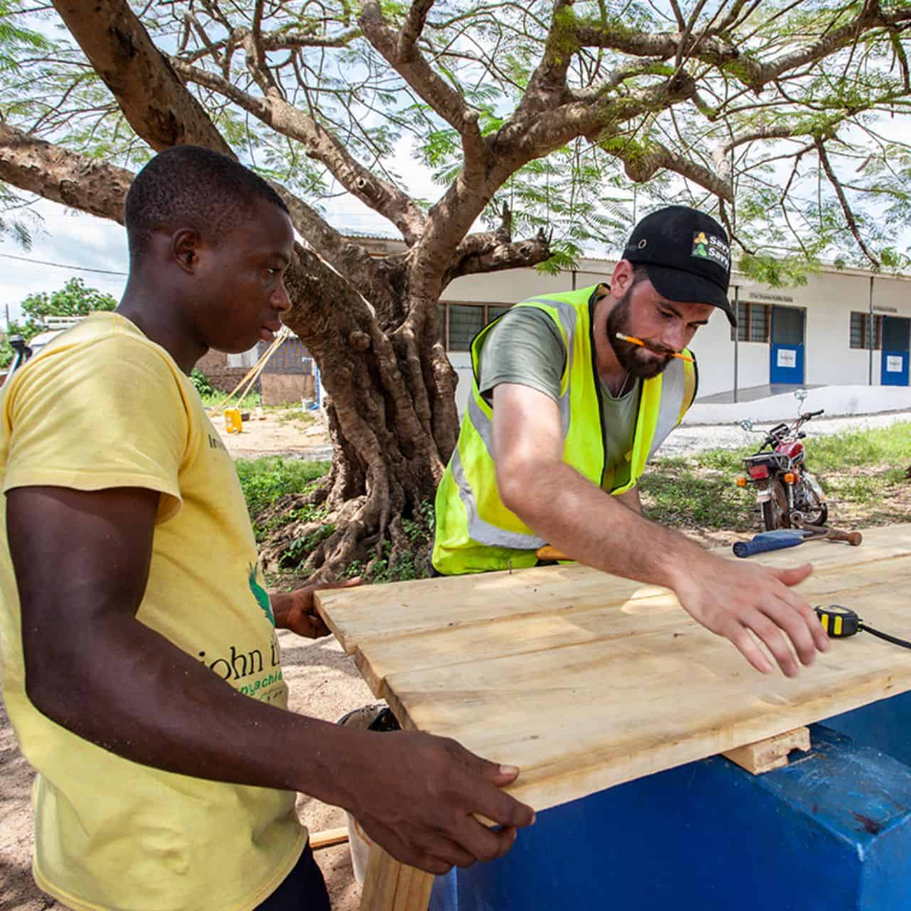 Volunteer helping to build a school in Ghana, West Africa